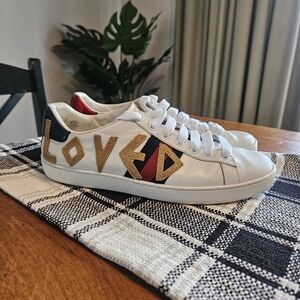 Gucci Authentic White Sneakers with Gold and Blue Accents